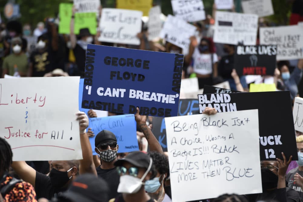 Demonstrators protest in Centennial Olympic Park, Friday, May 29, 2020 in Atlanta. Protests were organized in cities around the United States following the death of George Floyd during an arrest in Minneapolis. (Mike Stewart/AP)