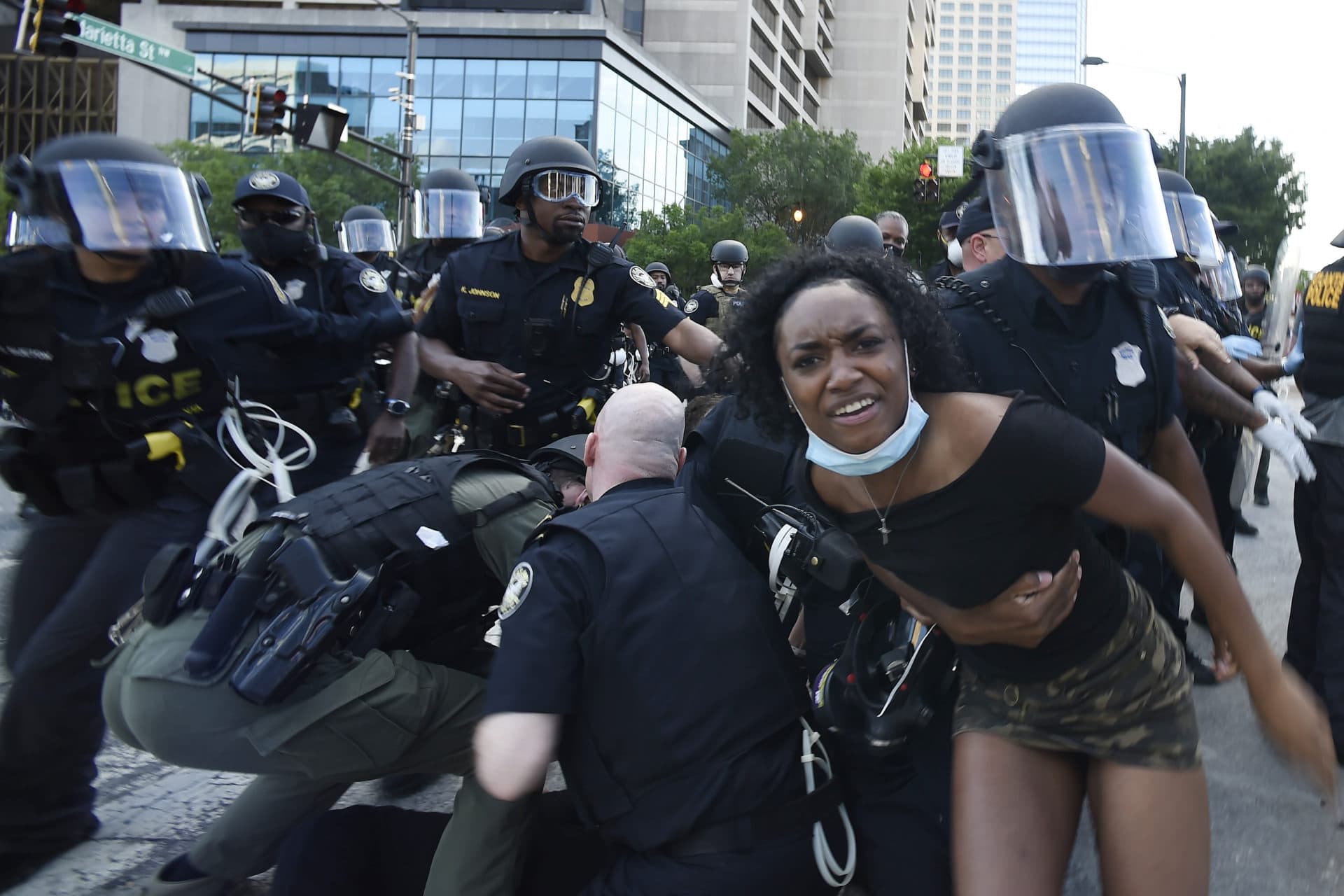 Atlanta Police detain demonstrators protesting, Saturday, May 30, 2020 in Atlanta. The protest started peacefully earlier in the day before demonstrators clashed with police. (AP Photo/Mike Stewart)