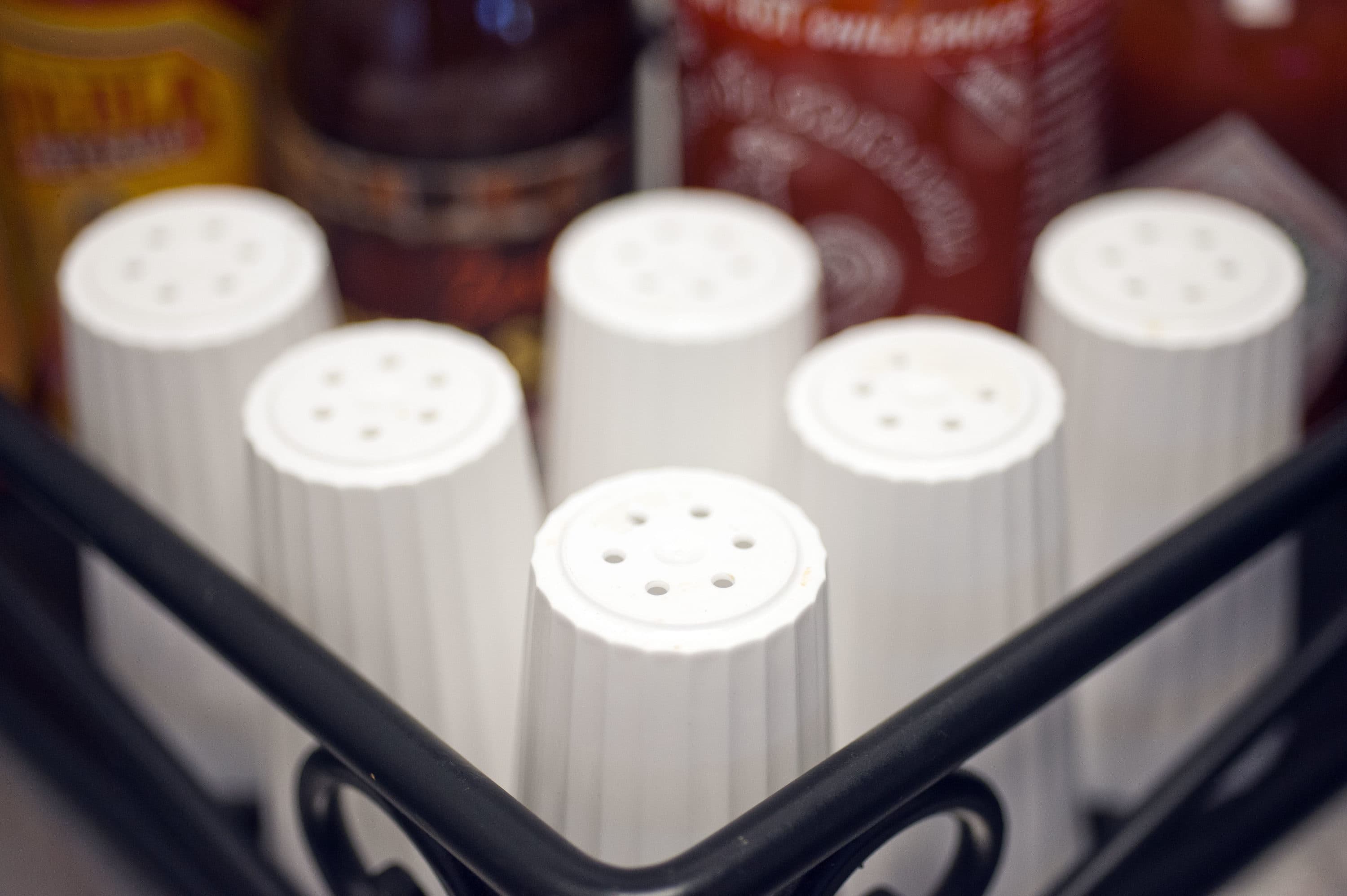Most Americans eat far more salt than they should, exceeding the dietary guidelines for sodium. (Cliff Owen/AP)