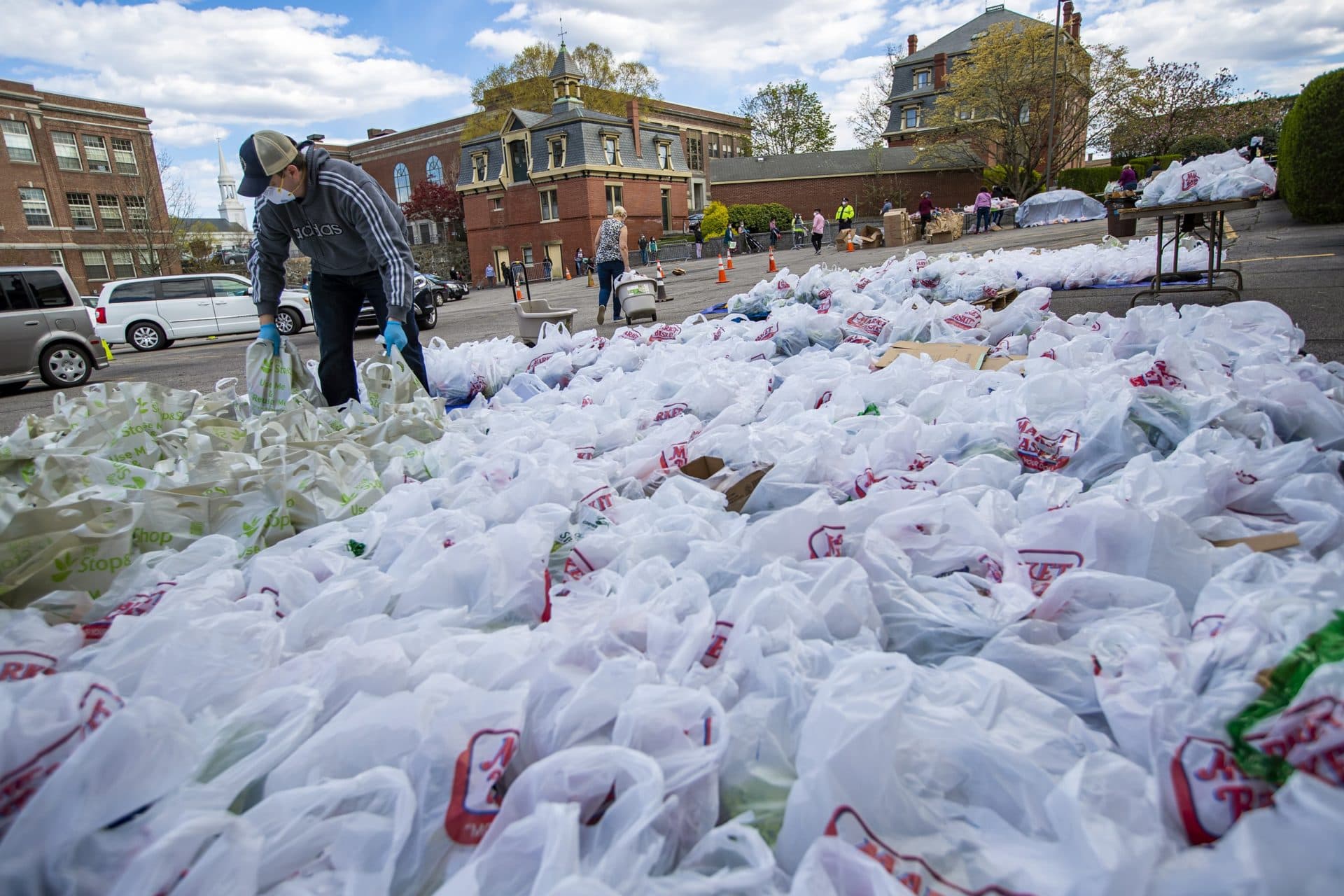 Prepared grocery bags at a food pantry at St. Mary Parish in Waltham. People seeking food assistance lined up on foot and in their vehicles for hours. (Jesse Costa/WBUR)