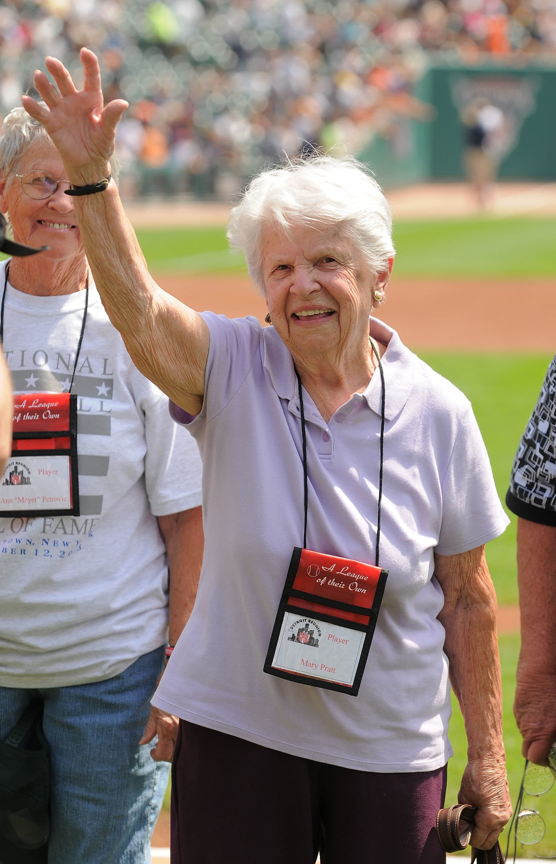 Mary Pratt waves to the crowd during a reunion ceremony before a 2010 game between the Detroit Tigers and the Chicago White Sox at Comerica Park in Detroit, Michigan. (Photo by Mark Cunningham/MLB Photos via Getty Images)
