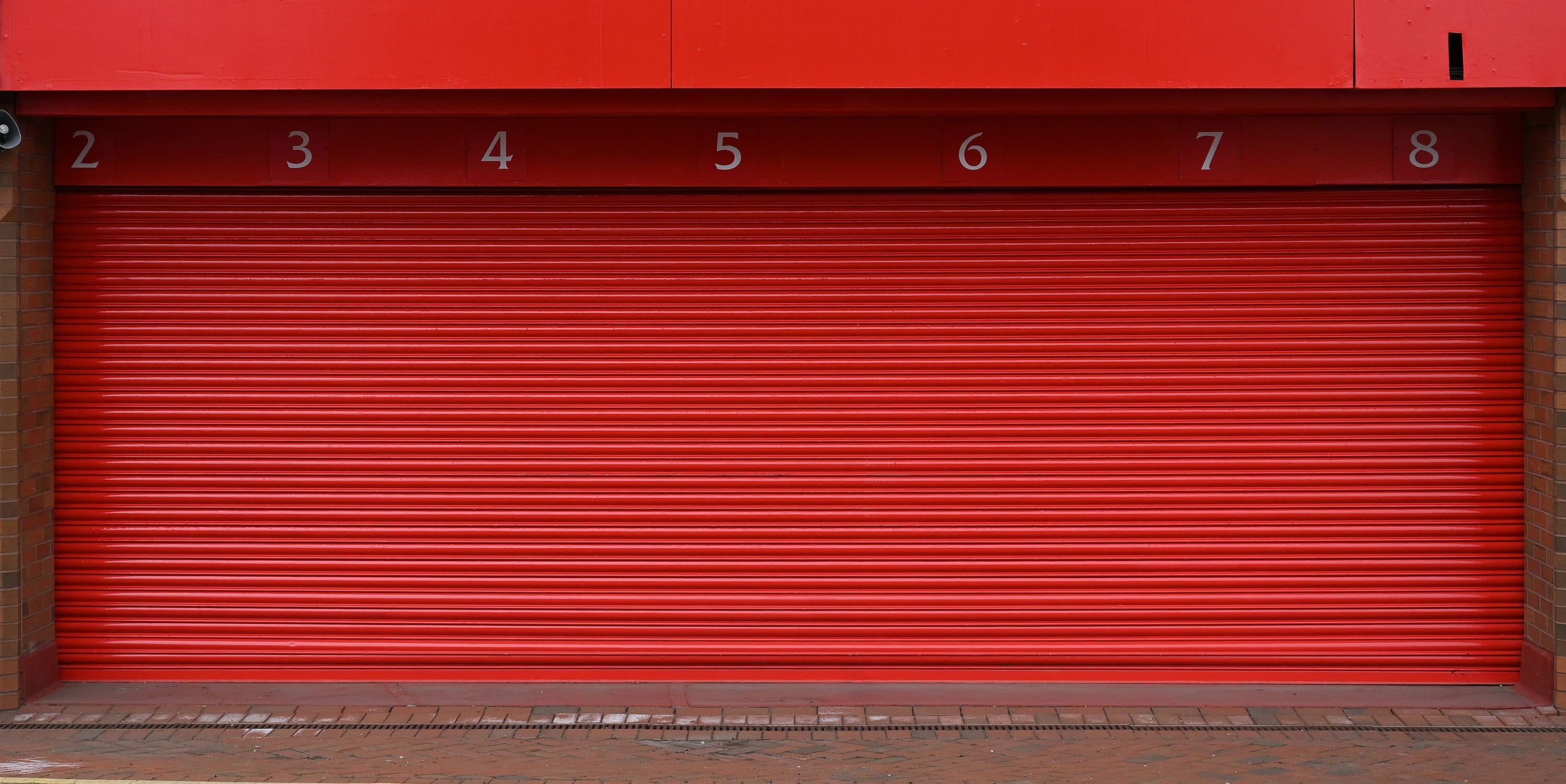 A picture shows a closed shutter at Liverpool football club's stadium Anfield in Liverpool, northwest England. (Paul Ellis/AFP via Getty Images)