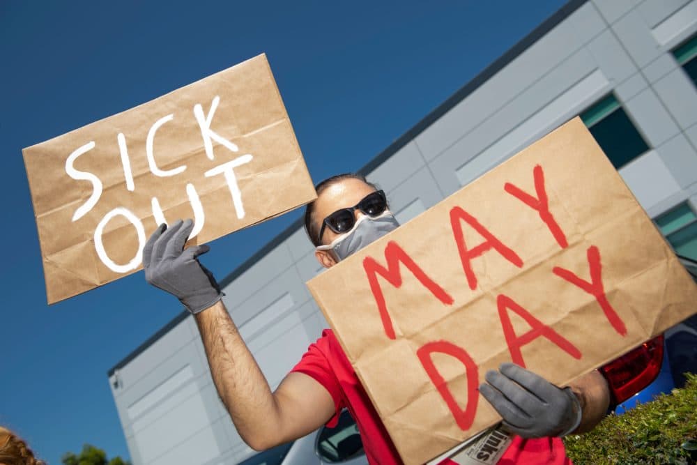 Workers protest against the failure from their employers to provide adequate protections in the workplace of the Amazon delivery hub on National May Day Walkout/Sickout by workers at Amazon, Whole Foods, Innstacart and Shipt amid the Covid-19 pandemic on May 1, 2020, in Hawthorne, California. (Valerie Macon/AFP via Getty Images)