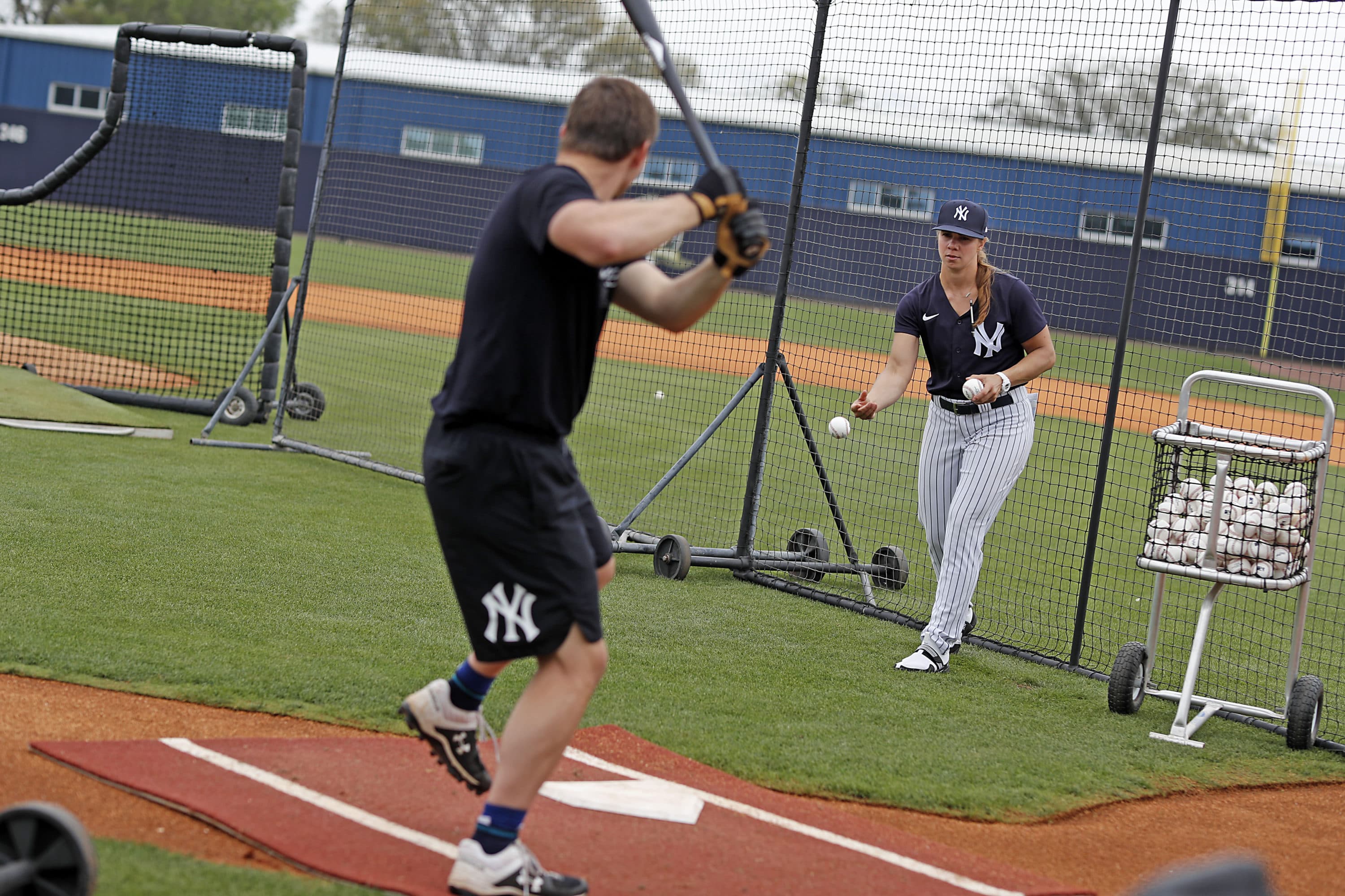 Part of Rachel Balkovec's new job as hitting coach is throwing soft toss and batting practice. (Courtesy Rachel Balkovec)