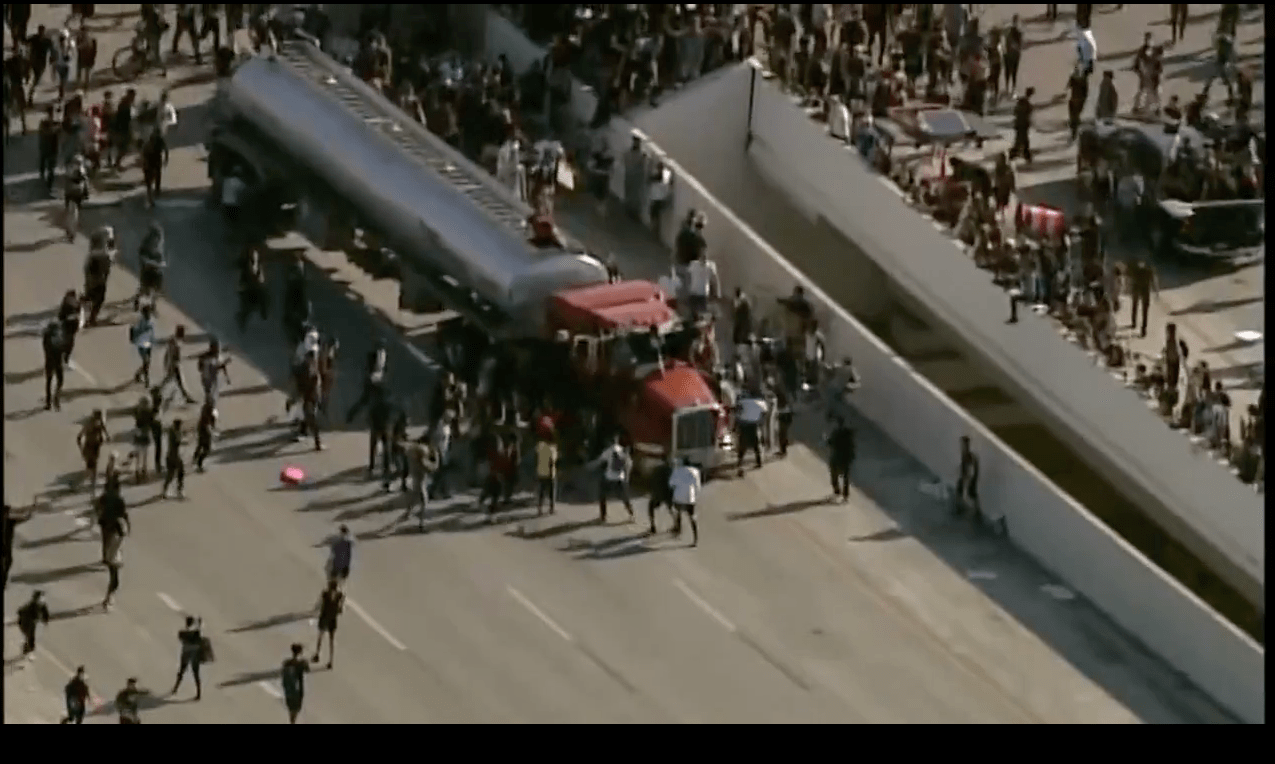 Semi-Trailer Drives Through Crowd Of Protesters On Minneapolis Highway, No One Hurt
