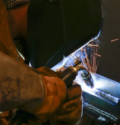 Seth McConnell practices a weld during his welding class at Washburn Tech. (Chris Neal/Shooter Imaging/Kansas News Service)