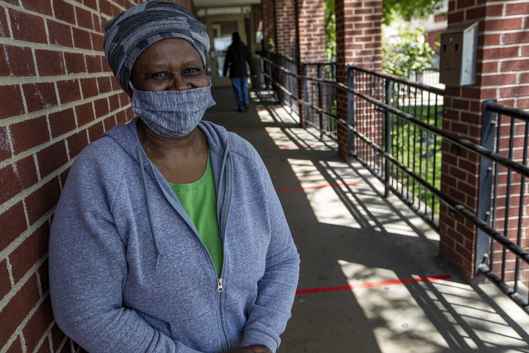 Lucy and other women who are housed and coming to the Rosie's Place food pantry tent can't go inside the facility for meals and services during the pandemic.