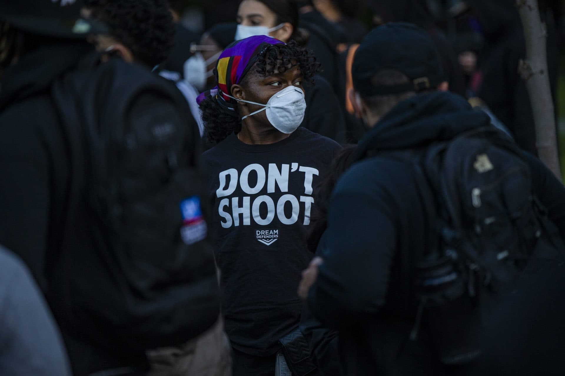 A woman wears a &quot;Don't shoot&quot; shirt during protest against police brutality on Sunday (Jesse Costa/WBUR)
