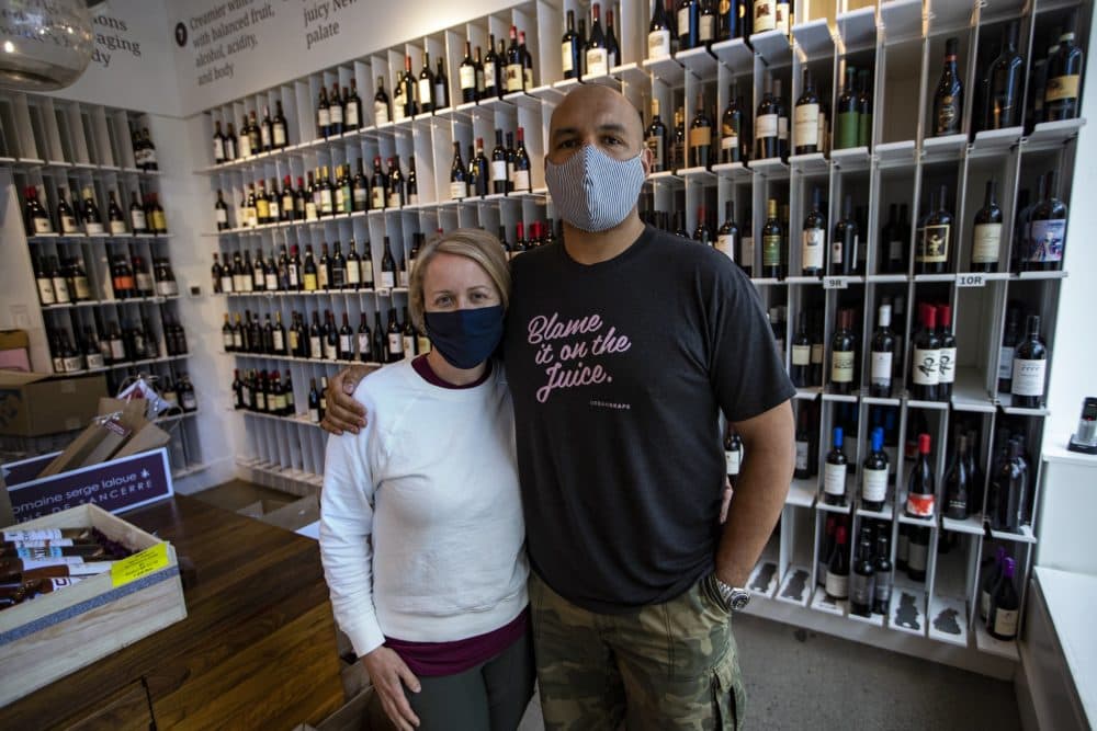 TJ and Hadley Douglas, co-owners of the Urban Grape in the South End. (Jesse Costa/WBUR)
