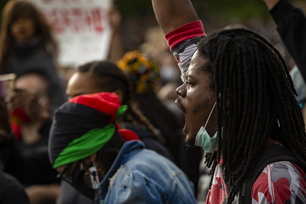 Protesters demonstrate during a 2020 BLM vigil in Boston
