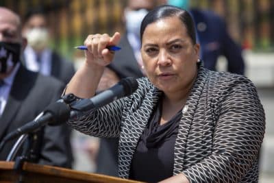 Rachael Rollins, speaking Tuesday, June 2, at the gates of the Massachusetts State House. (Robin Lubbock/WBUR)