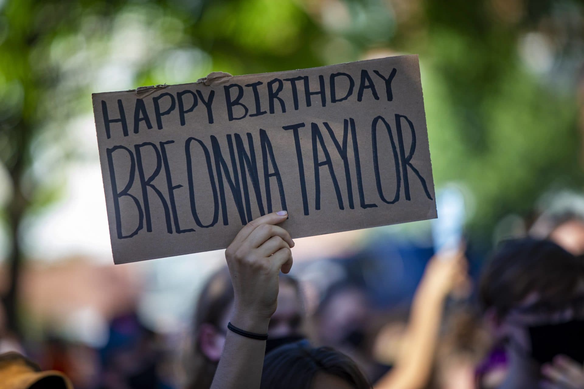 A sign at a vigil in Boston marking the birthday of Breonna Taylor. (Jesse Costa/WBUR)
