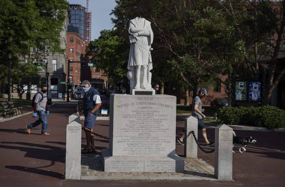 The now headless statue of Christopher Columbus in Columbus Waterfront Park in Boston. (Robin Lubbock/WBUR)