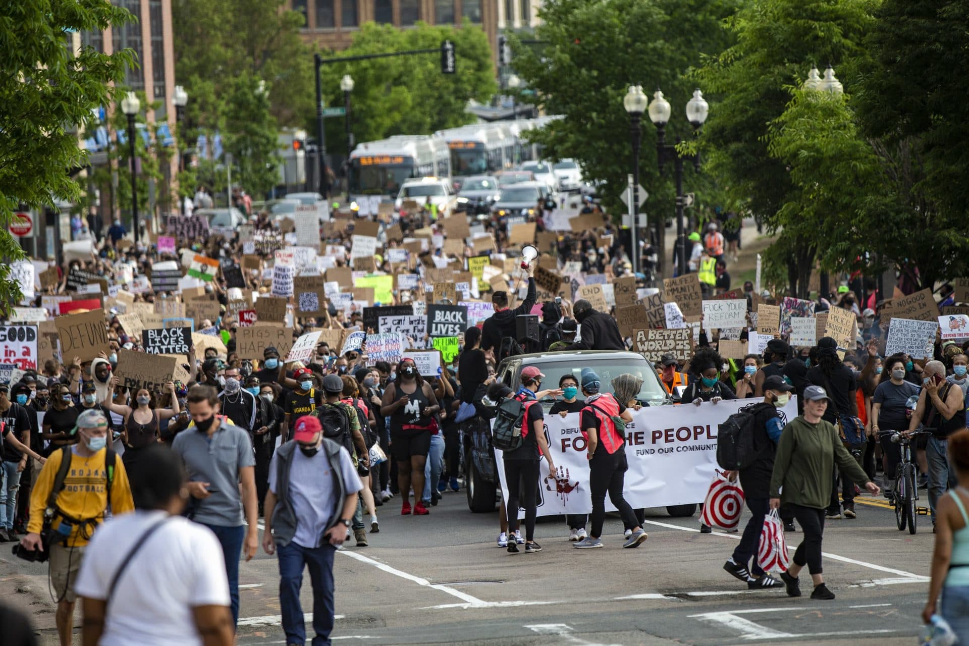 Hundreds of protesters march up Washington Street en route to Boston City Hall during the F.T.P. March to Defund Police and Fund Our Communities. (Jesse Costa/WBUR)