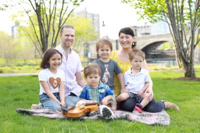 Christopher and Zaure Vuk, with their children Arella, Altair, Arden and Eldar. (Courtesy)