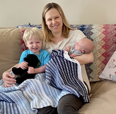 Amy Scheuerman at home with 2-year-old Ramsey and 3-week-old Wesley. (Courtesy)