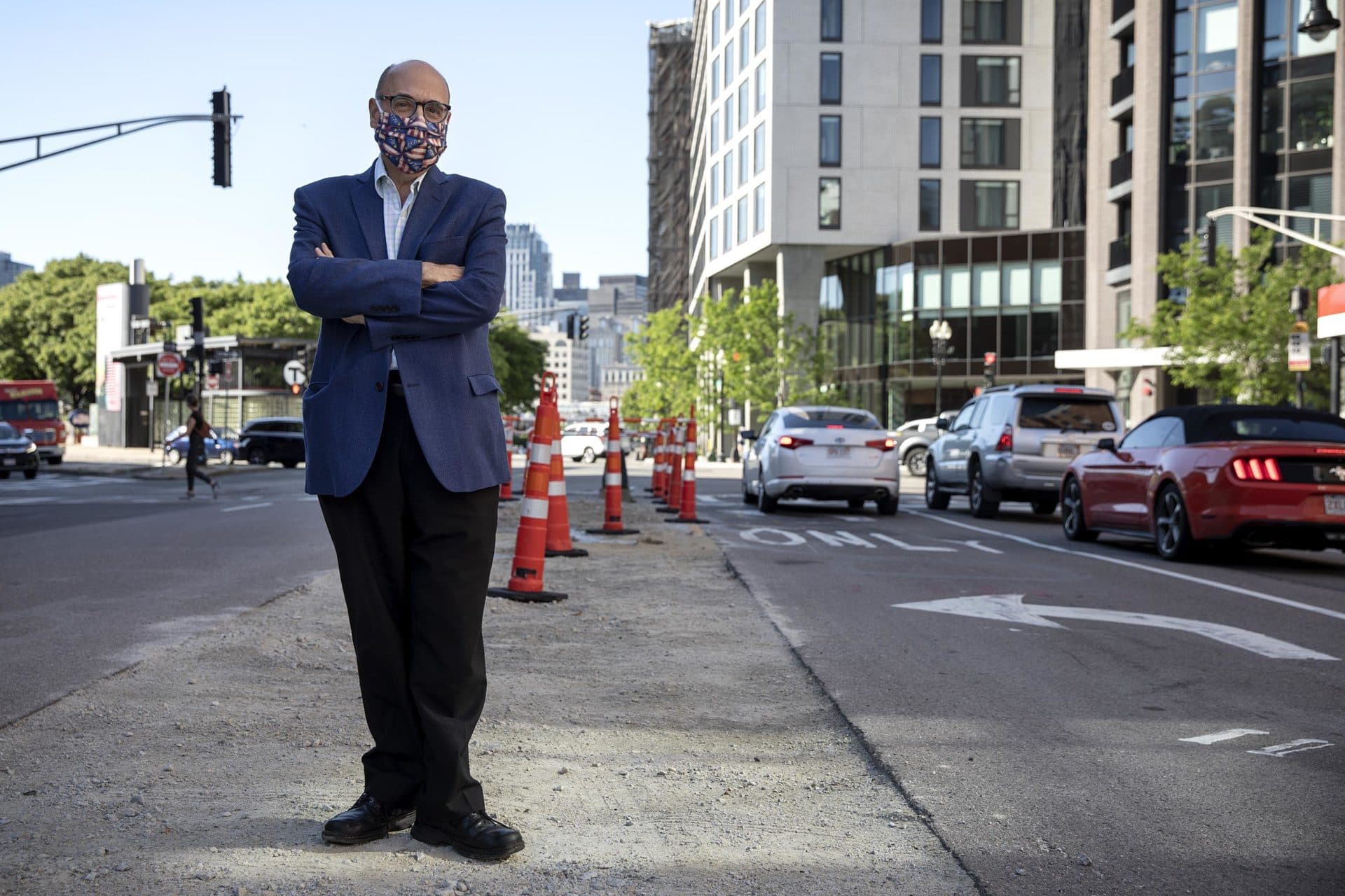 Former Mass. Transportation Secretary Jim Aloisi stands on Dorchester Avenue in Boston. (Robin Lubbock/WBUR)