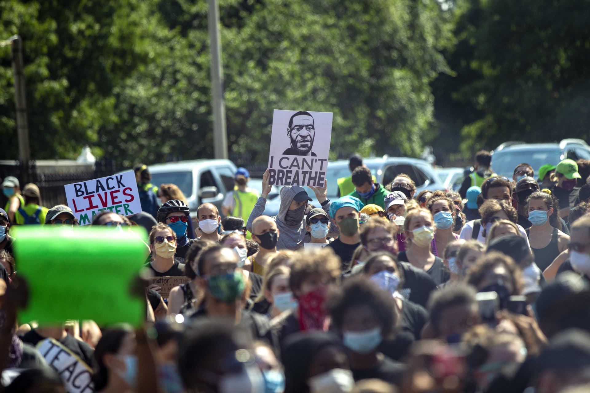 Protesters gather in front of the Massachusetts State House. (Jesse Costa/WBUR)