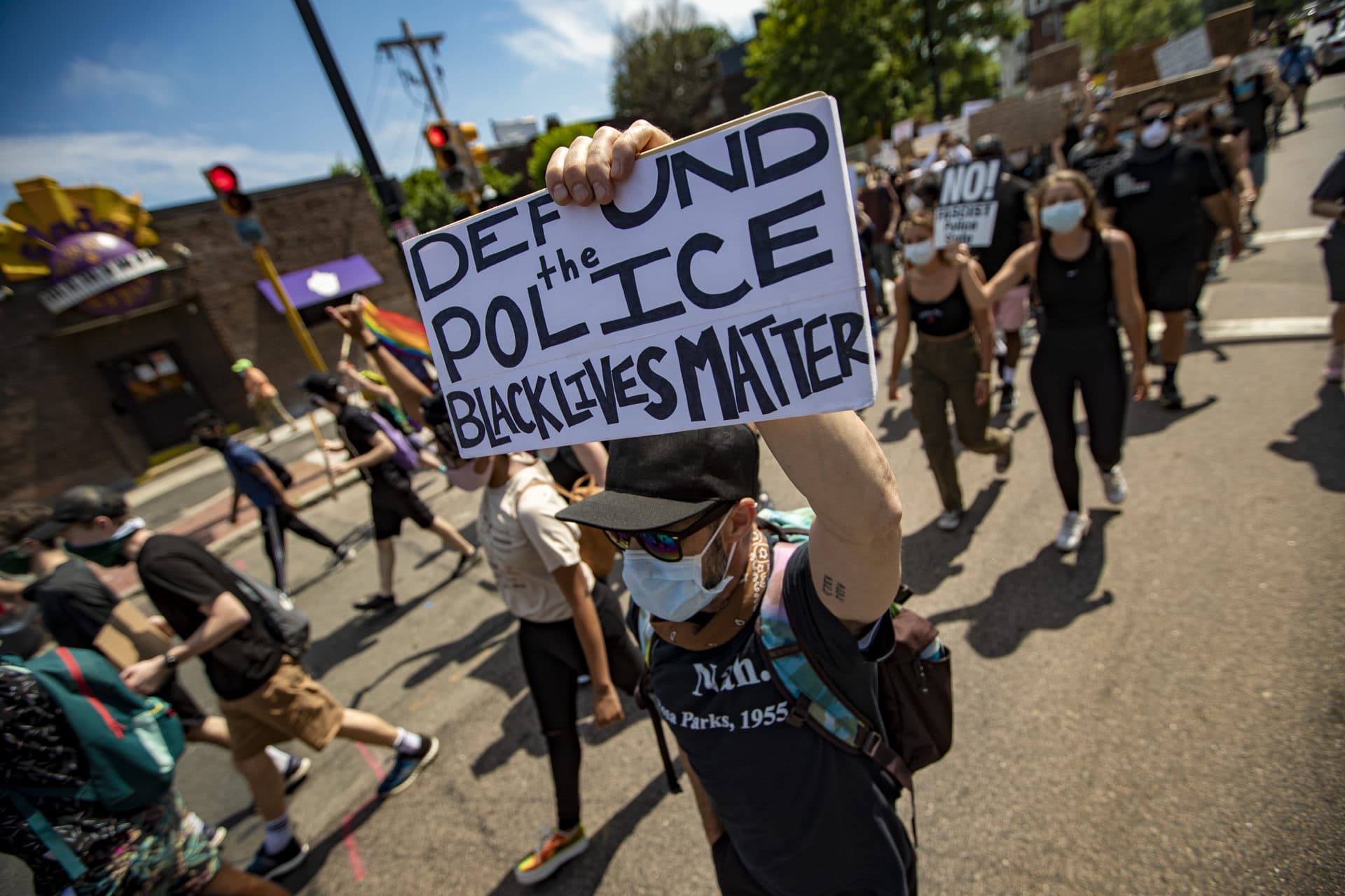 Protesters march up Tremont Street. (Jesse Costa/WBUR)