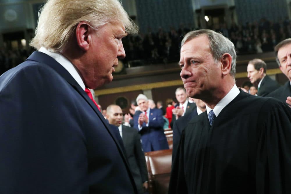 President Donald Trump greets Supreme Court Chief Justice John Roberts as he arrives to deliver his State of the Union address to a joint session of Congress in the House Chamber on Capitol Hill in Washington, Tuesday, Feb. 4, 2020. (Leah Millis/AP)