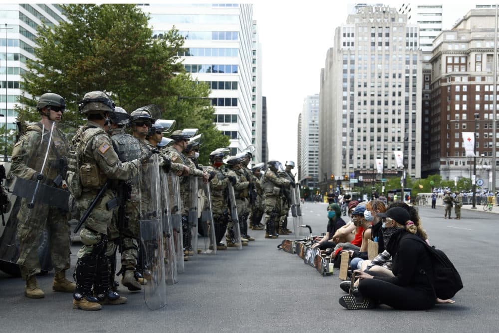 Protesters rally in front of Pennsylvania National Guard soldiers, Monday, June 1, 2020, in Philadelphia, over the death of George Floyd, a black man who was in police custody in Minneapolis. (Matt Slocum/AP Photo)