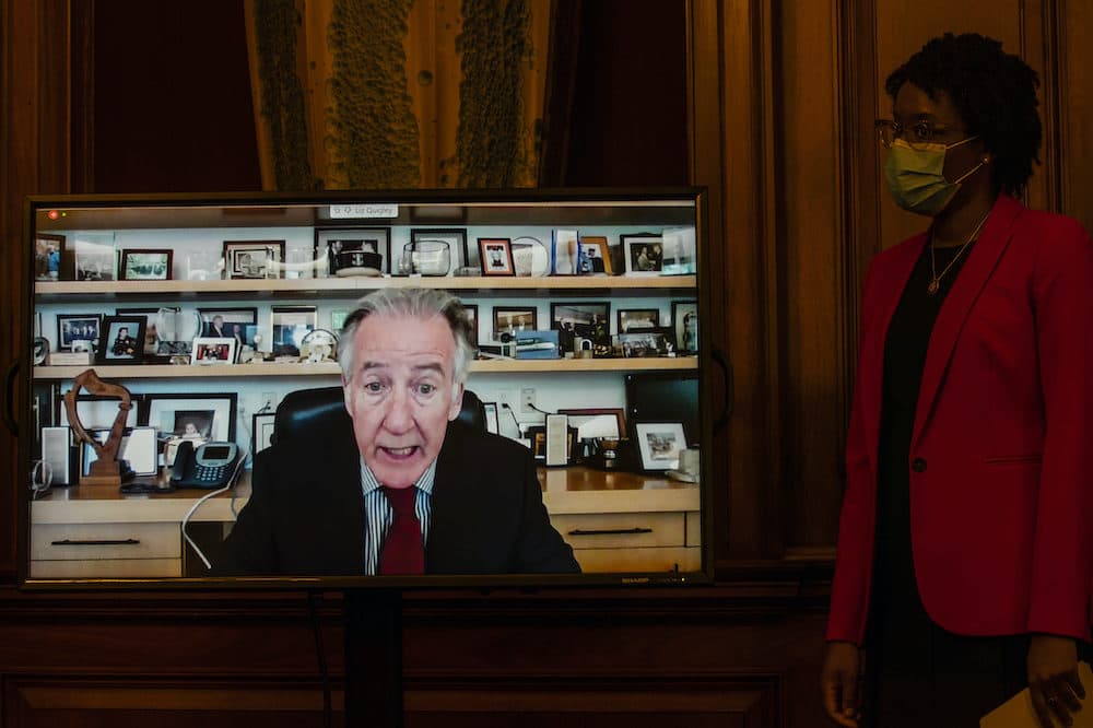 Rep. Richard Neal, D-Mass., on a video monitor as Rep. Lauren Underwood, D-Ill., right, together with other House Democrats watch and listen during a news conference unveiling of the Patient Protection and Affordable Care Enhancement Act on Capitol Hill in Washington on June 24. (AP Photo/Manuel Balce Ceneta)