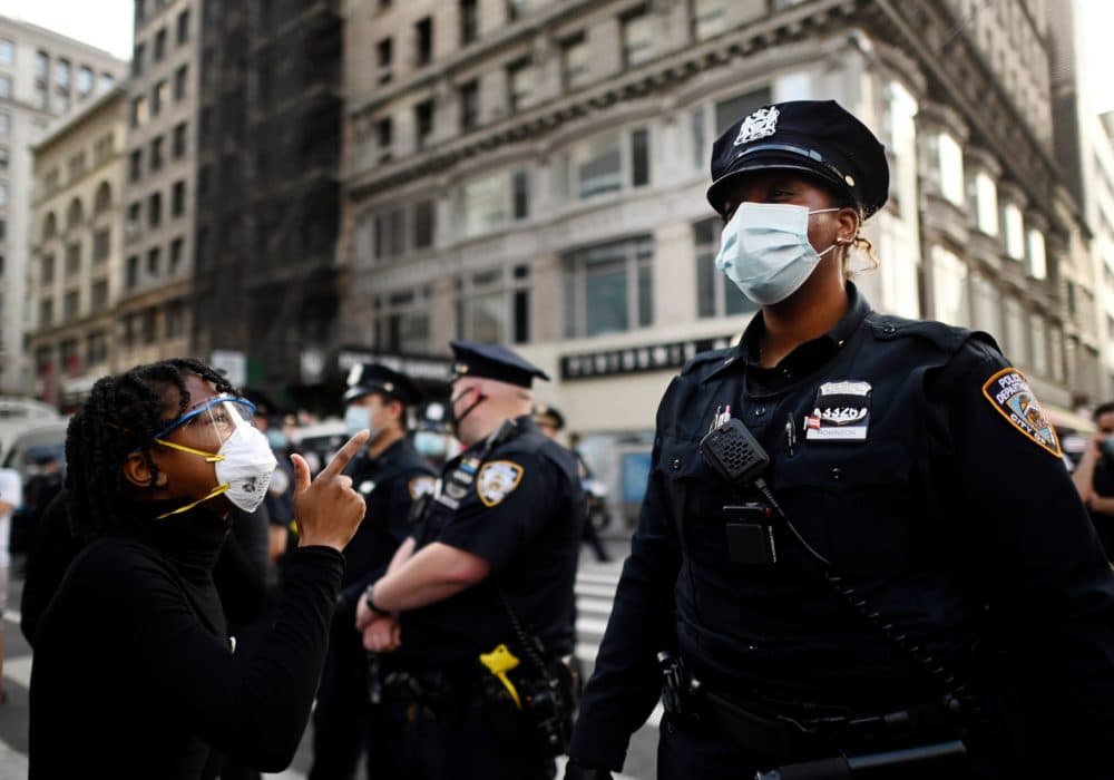 Protesters shout in front of NYPD officers during a demonstration on May 28, 2020 in New York City. (Johannes Eisele/AFP/Getty Images)