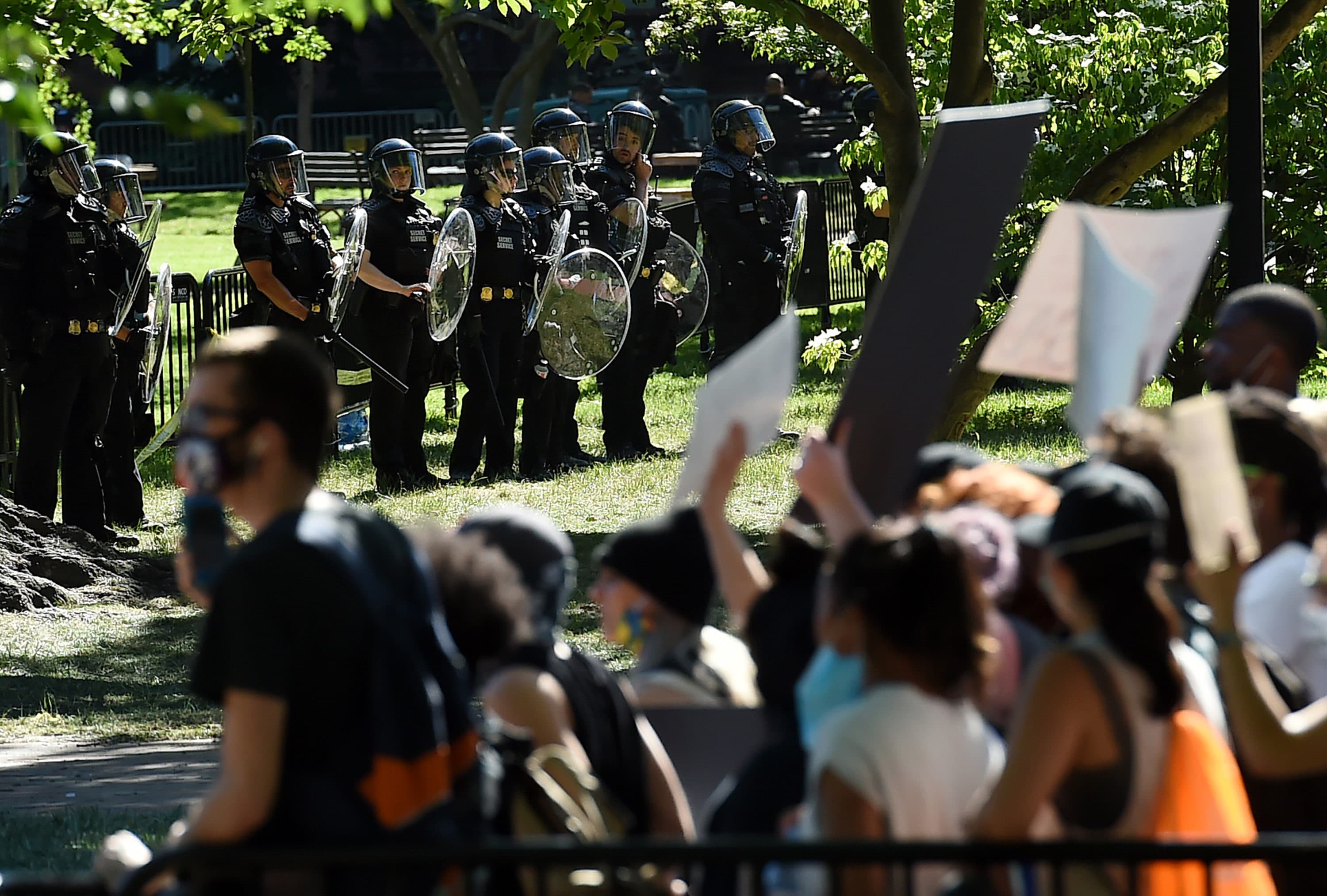 U.S. Park Police stand watch inside Lafayette Square near the White House in Washington, DC on June 1, 2020 as demonstrators protest the death of George Floyd. Police fired tear gas outside the White House as anti-racism protesters again took to the streets to voice fury at police brutality. (OLIVIER DOULIERY/AFP via Getty Images)