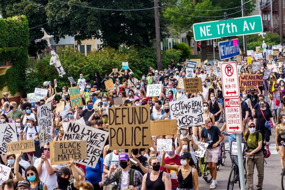 Demonstrators march against racism and police brutality and to defund the Minneapolis Police Department on June 6, 2020 in Minneapolis. (Kerem Yucel/AFP/Getty Images)