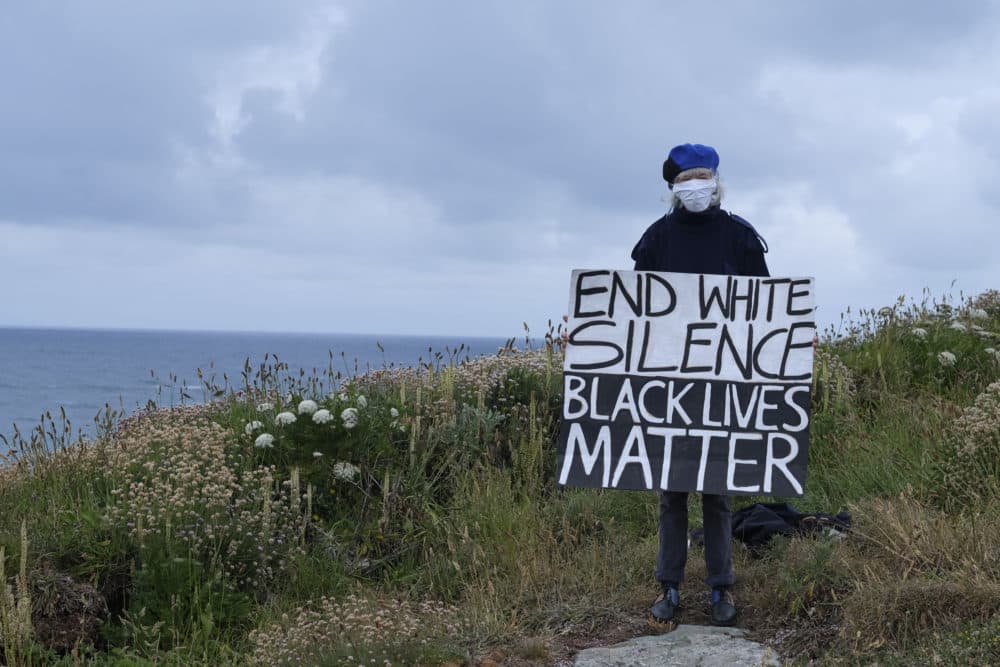 Climate change activists from Extinction Rebellion standing in solidarity with worldwide Black Lives Matter protests following the death of George Floyd, Sunday June 7, 2020 in St Ives, United Kingdom.(Gav Goulder/In Pictures via Getty Images)
