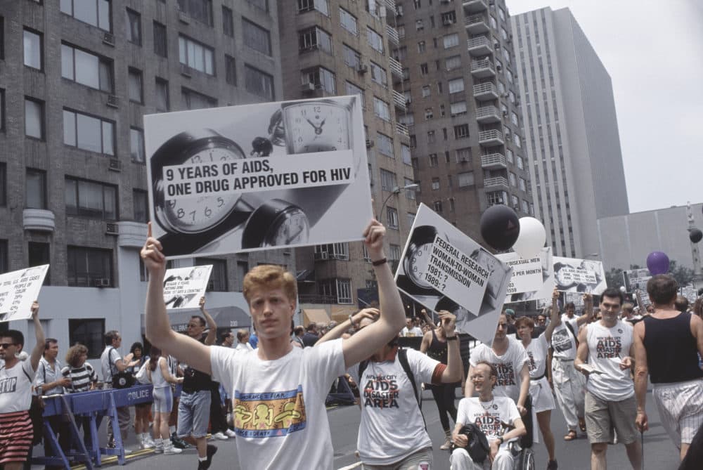 Marchers at the Pride Parade, Sunday, June 25, 1989 in New York, New York, carry signs '9 years of AIDS, One drug approved for HIV.' (Mariette Pathy Allen/Getty Images)