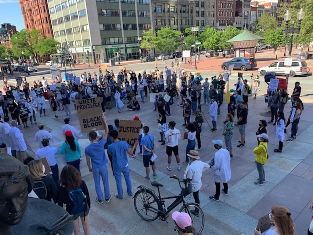 Health care workers at the ‘White Coats For Black Lives’ rally in Copley Square on Sunday. (Photo courtesy Raabia Malik)