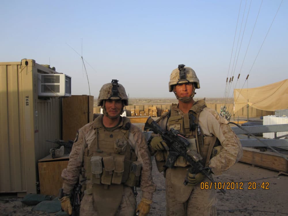 The author, R, with a fellow Marine, L, in Helmand Province, Afghanistan, where he commanded infantry in 2012. (Courtesy Jake Auchincloss)