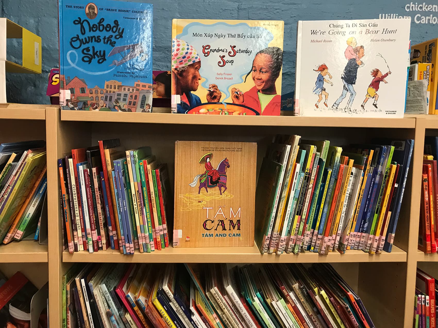 Children's books in Vietnamese and English on display in the Mather Elementary public library.