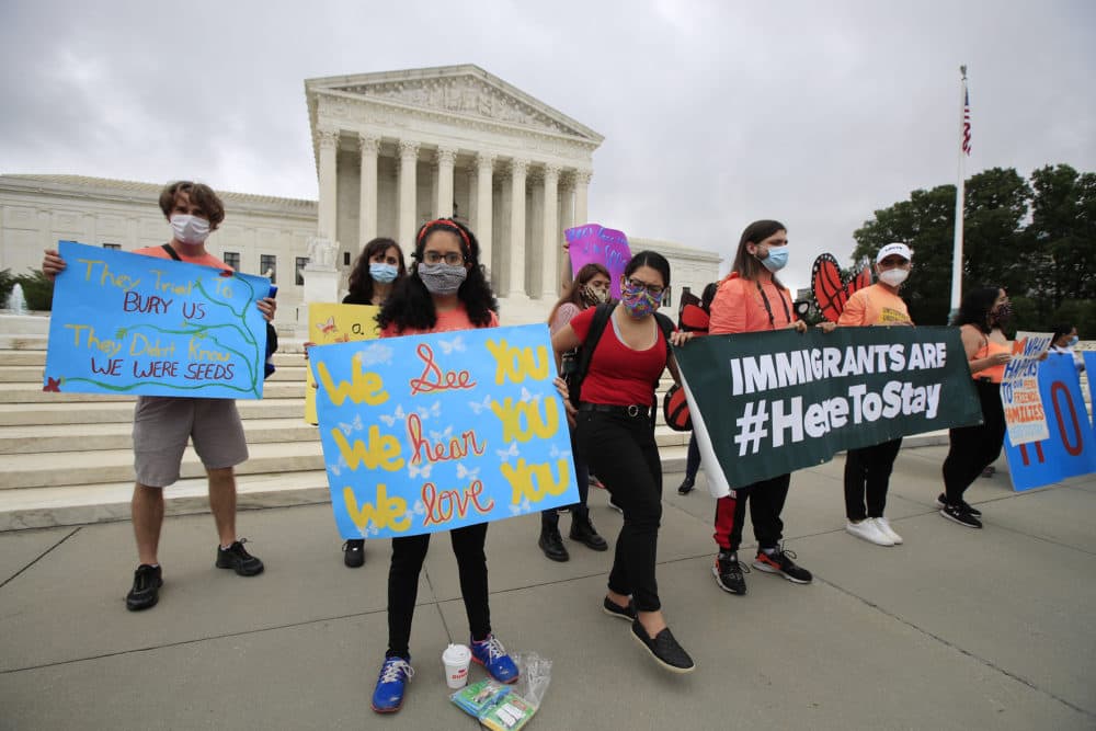 Deferred Action for Childhood Arrivals (DACA) students celebrate in front of the Supreme Court after it rejected President Trump's effort to end legal protections for young immigrants on Thursday in Washington. (Manuel Balce Ceneta/AP)