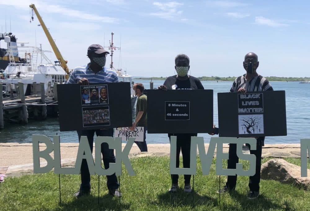 Charles Evans (right), Seyana Mawusi (center), and Paul Glass (left) at a Black Lives Matter protest on Cape Cod. (Courtesy)