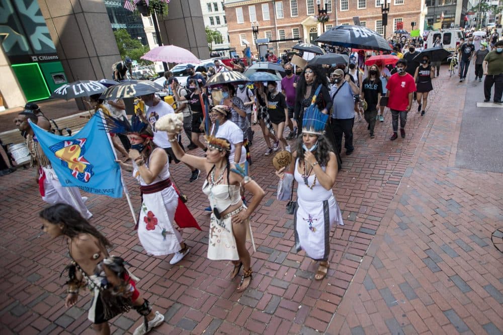 Protesters march towards City Hall Plaza during the Dismantle Now! BIPOC Solidarity Against White Supremacy. (Jesse Costa/WBUR)