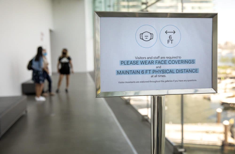 Museum visitors are reminded to follow new safety protocols. (Robin Lubbock/WBUR)