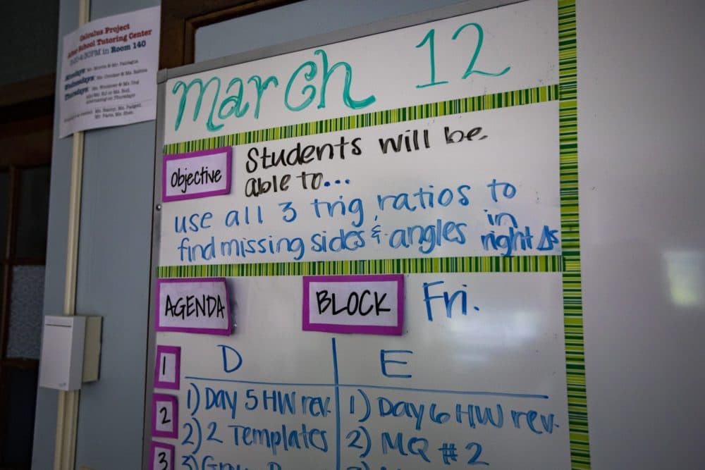 A whiteboard in a classroom with the day’s assignments, dated for March 12, the last of school in Brookline before classes were suspended due to the coronavirus pandemic. (Jesse Costa/WBUR)