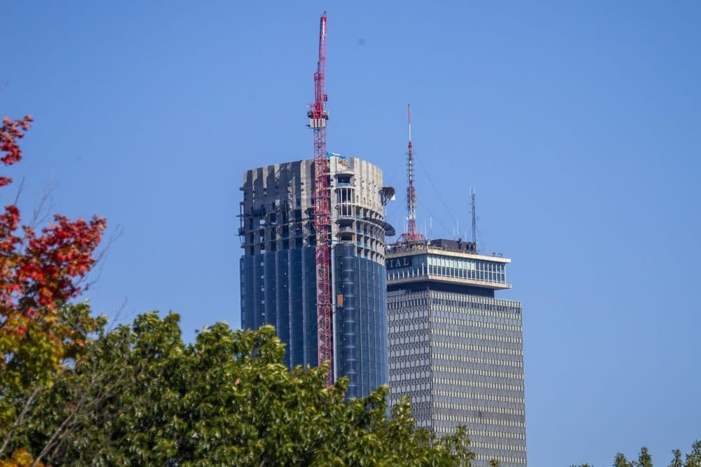 The tops of One Dalton Place and the Prudential as seen from Roxbury. (Jesse Costa/WBUR)