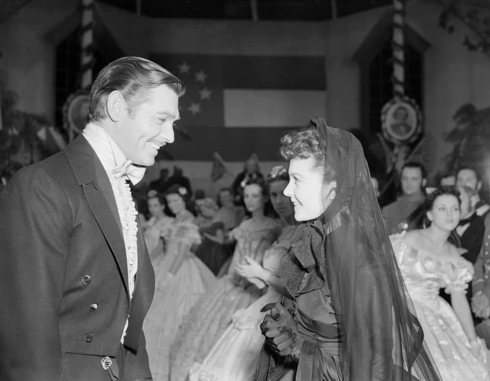Scene from film version of "Gone With the Wind" showing Clark Gable as Rhett Butler and Vivien Leigh as Scarlett O'Hara attending a Civil War ball March 7, 1939. (AP)