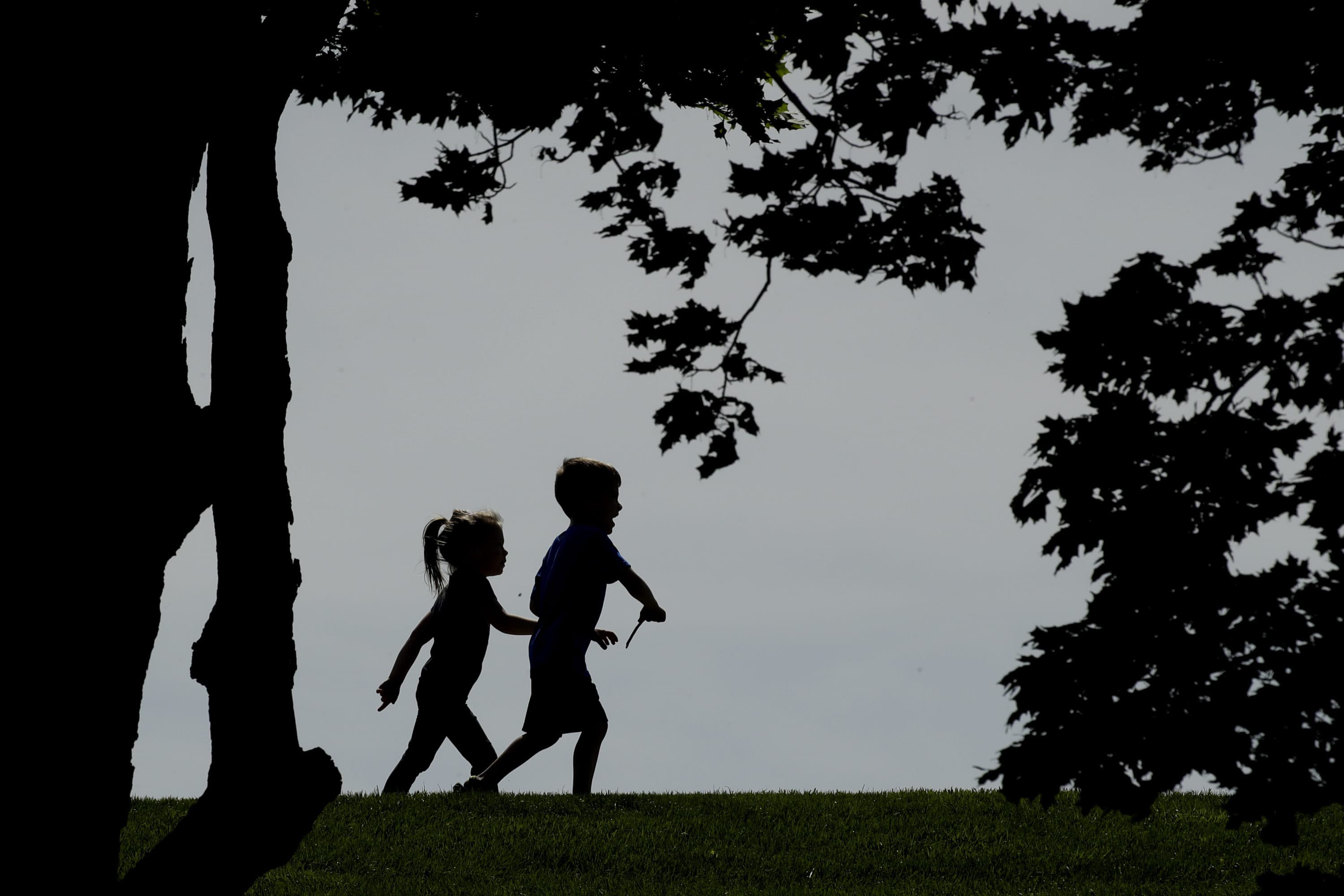As states debate reopening schools, some child psychologists are expressing another worry— that schools won't be prepared to deal with kids' mental trauma when they do go back. (Charlie Riedel/AP)