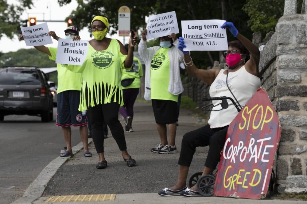 People rally for protection from evictions, June 27, 2020, in Mattapan. (Michael Dwyer/AP)