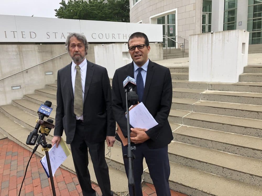 Attorneys Thomas Lesser and Michael Aleo outside the federal courthouse in Springfield. (Alden Bourne/NEPM)