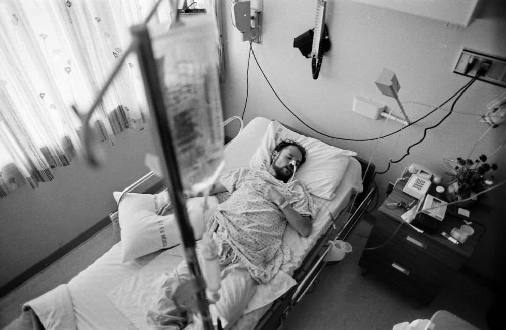 Deotis McMather, circa 1983, asleep in bed at San Francisco General's AIDS ward 5B. After being diagnosed with AIDS, he returned to his apartment where all of his belongings were thrown out onto the street.(Steve Ringman/San Francisco Chronicle via Getty Images)