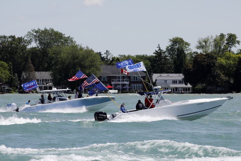 Boaters participate in the &quot;Make america Great Again&quot; parade as they celebrate US President Donald Trump's 74th birthday on the Detroit River in Detroit, Michigan on June 13, 2020. - The parade is hosted by the Michigan Conservative Coalition and Michigan Trump Republicans 2020. (Jeff Kowalsky/AFP)