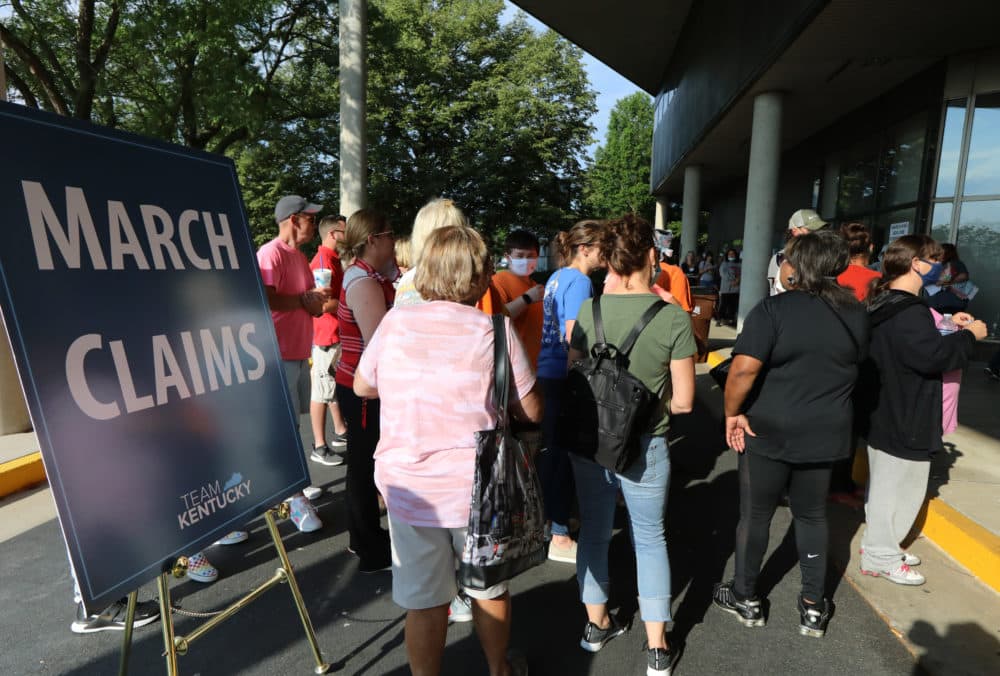 FRANKFORT, KY - JUNE 19: Hundreds of unemployed Kentucky residents wait in long lines outside the Kentucky Career Center for help with their unemployment claims on June 19, 2020 in Frankfort, Kentucky. (Photo by John Sommers II/Getty Images)