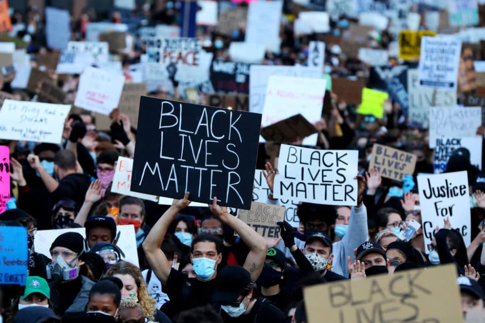 Demonstrators in Boston, Massachusetts, protest in response to the death of George Floyd. (Maddie Meyer/Getty Images)