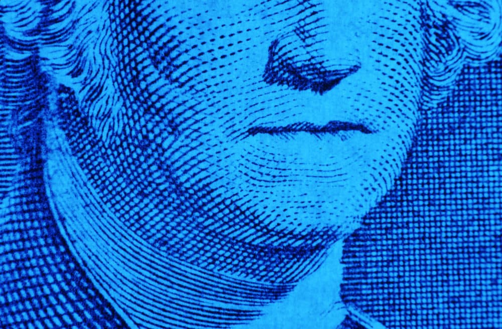 George Washington's mouth on a $1 bill. (Getty)