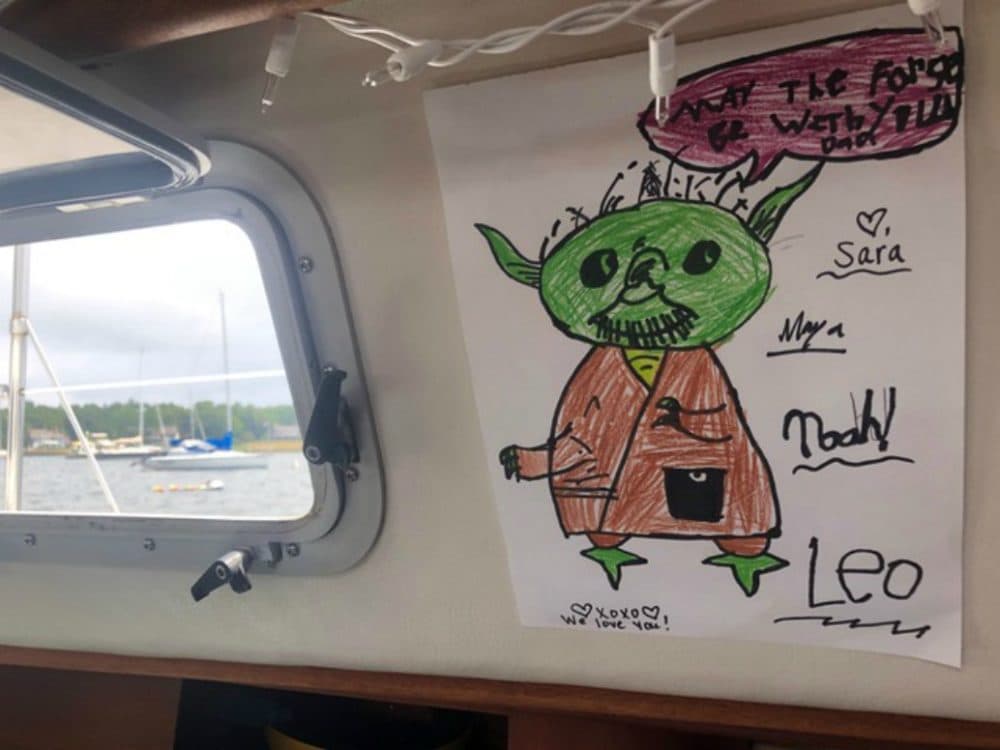 A poster featuring Yoda and the words, "May the force be with you" hangs in the boat where the author's husband, an ER doctor, quarantined for 10 weeks. (Courtesy)